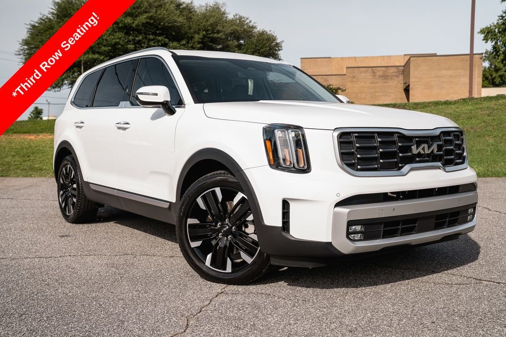 Used 2025 White Pearl Kia SX image 1