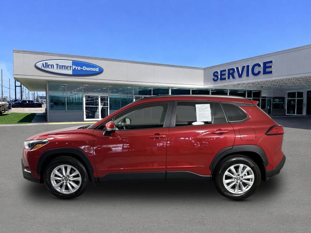 Used 2024 Barcelona Red Metallic Toyota LE image 5
