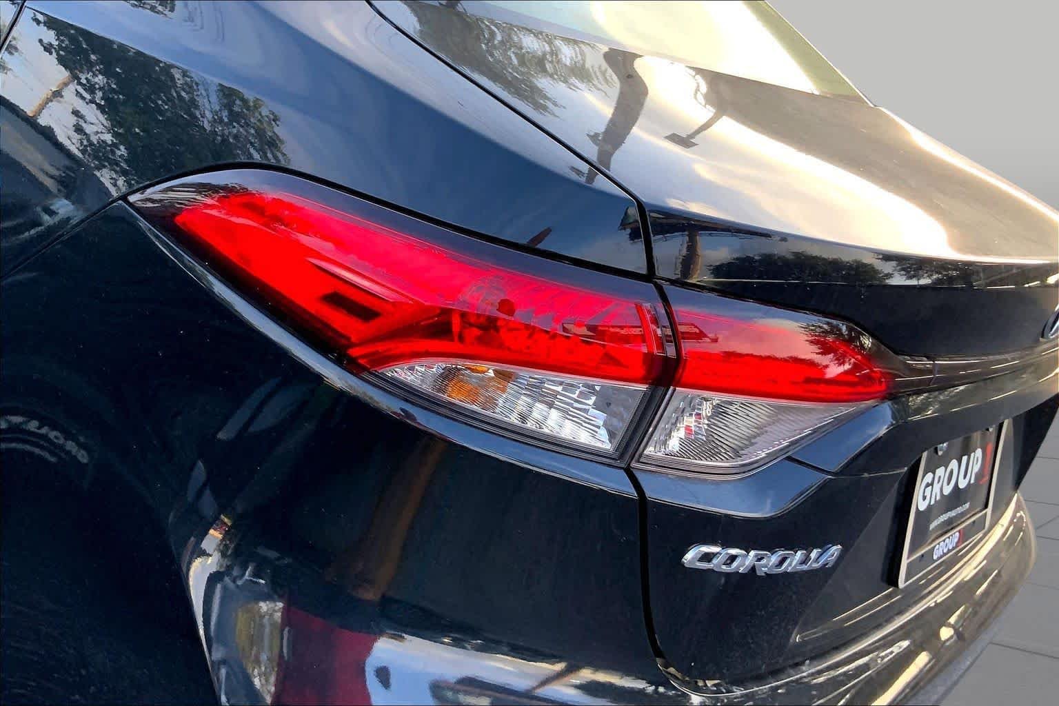 Used 2026 Midnight Black Metallic Toyota Hybrid LE image 27