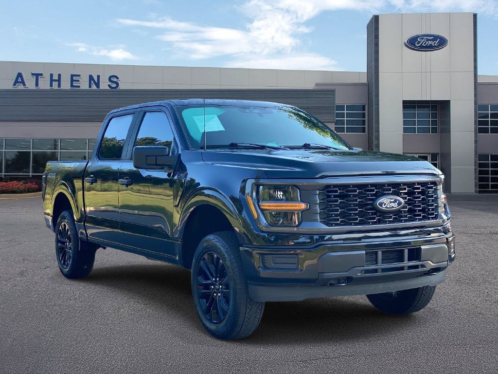 Used 2025 Agate Black Metallic Ford STX image 1
