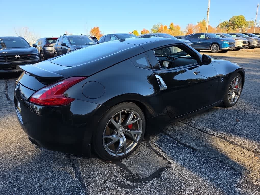 Used 2016 Magnetic Black Nissan Sport Tech image 16
