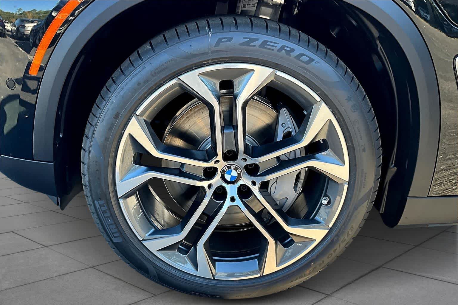 New 2026 Black Sapphire Metallic BMW xDrive50e image 11