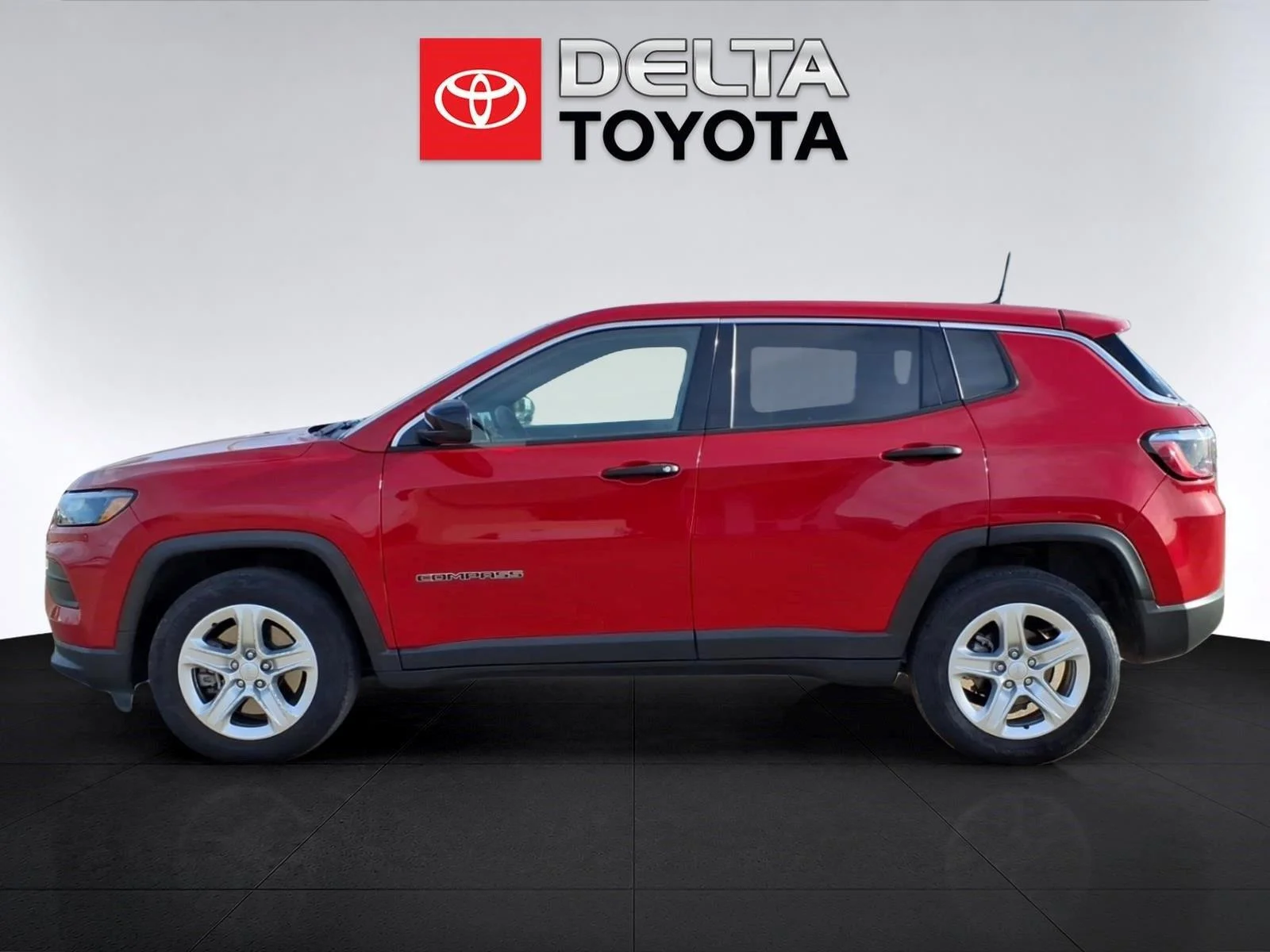 Used 2023 Redline Pearlcoat Jeep Sport image 2