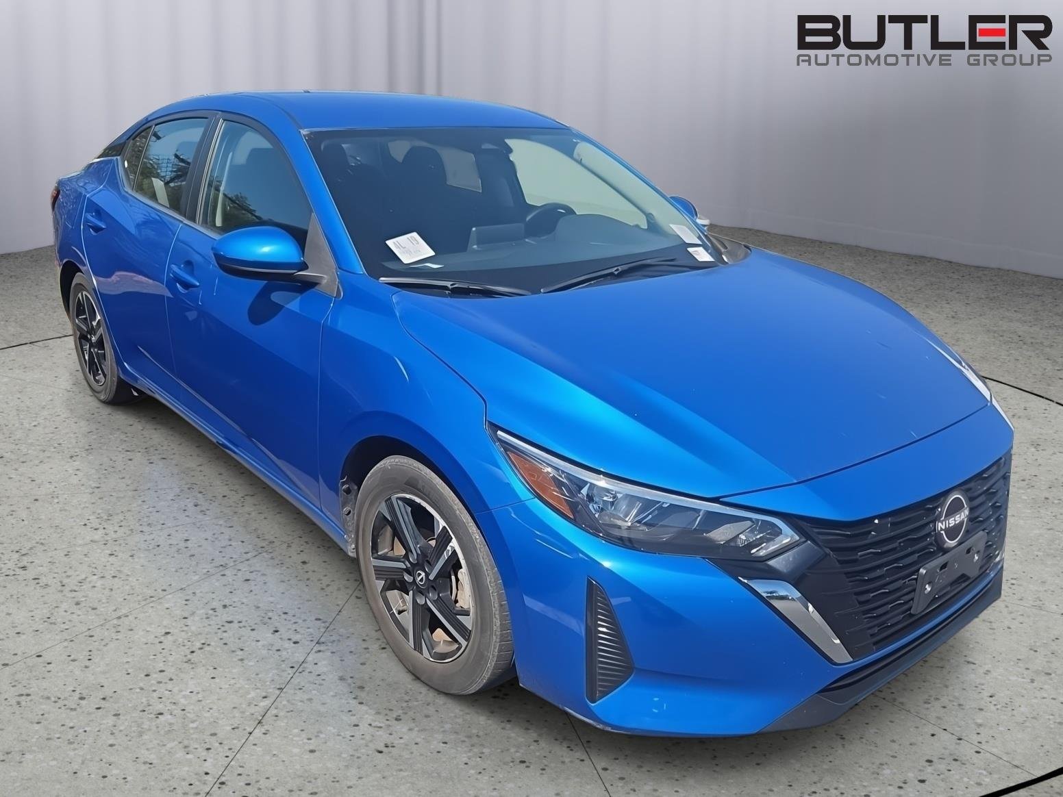Used 2025 Electric Blue Metallic Nissan SV image 2