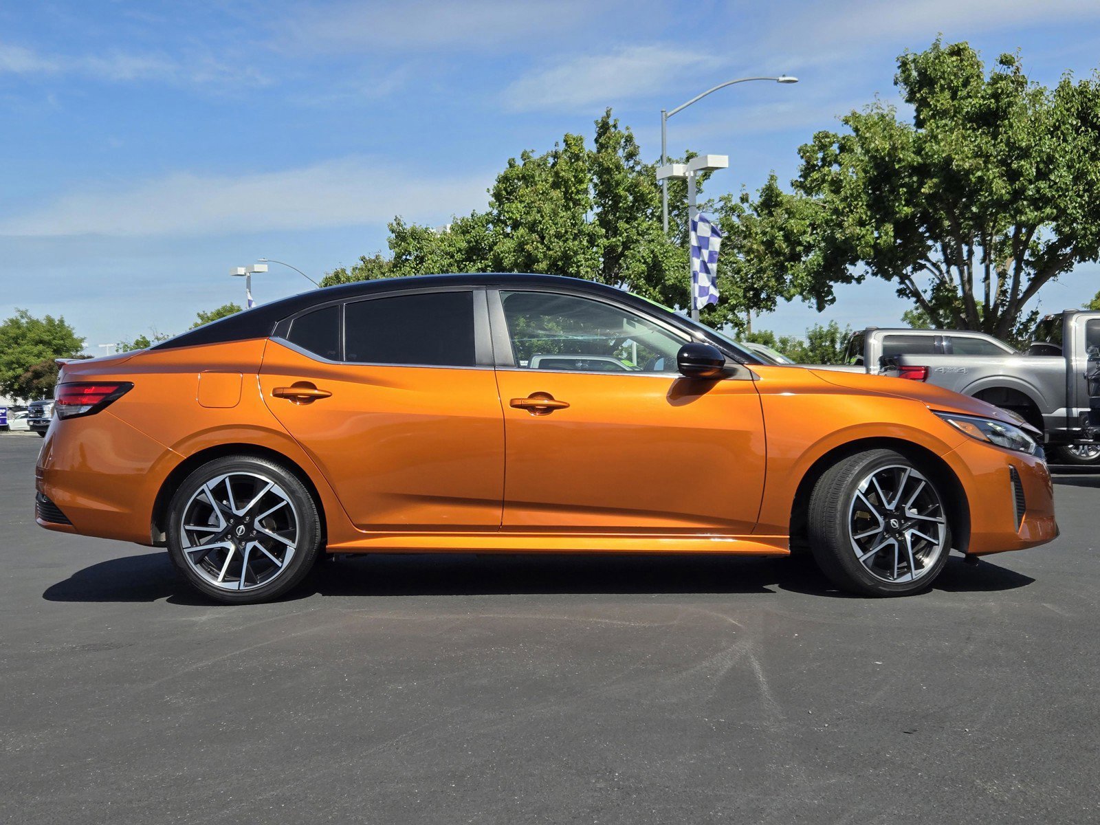 Used 2024 Monarch Orange Metallic/Super Black Nissan SR image 3