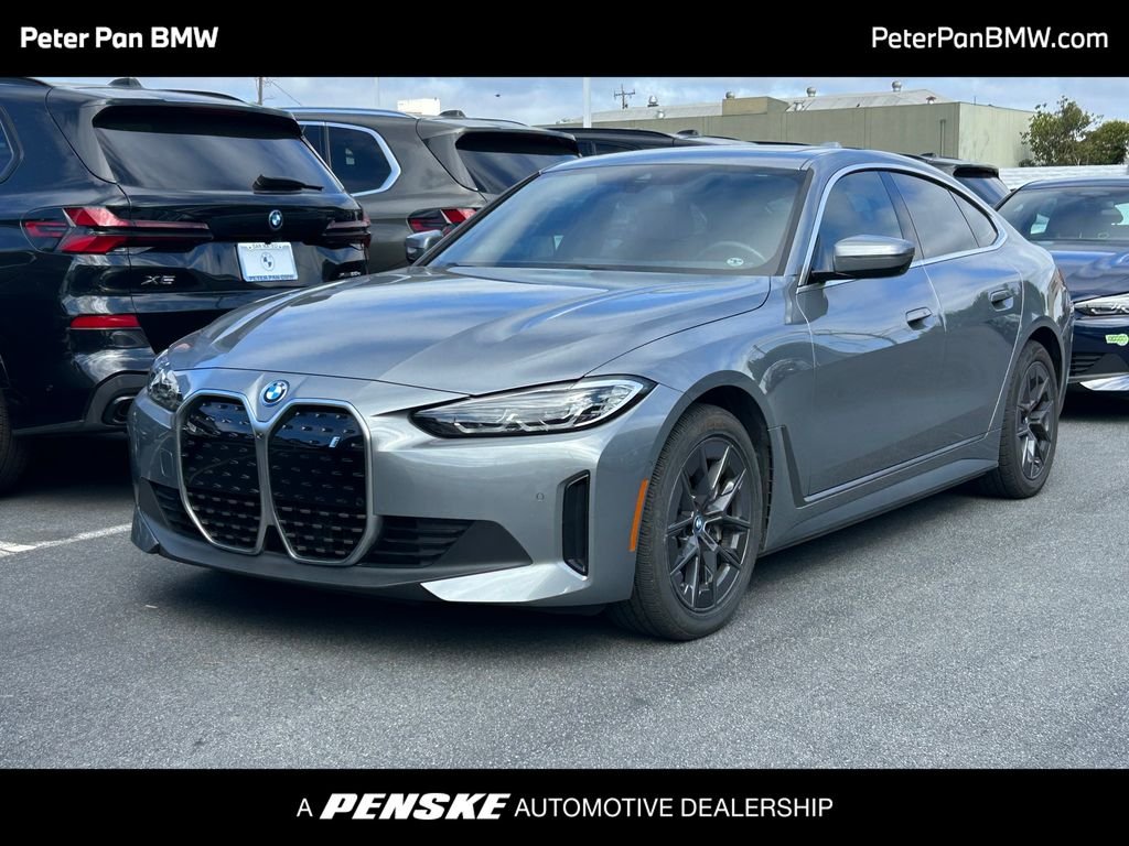 Certified Used 2024 Gray Metallic BMW eDrive40 image 1