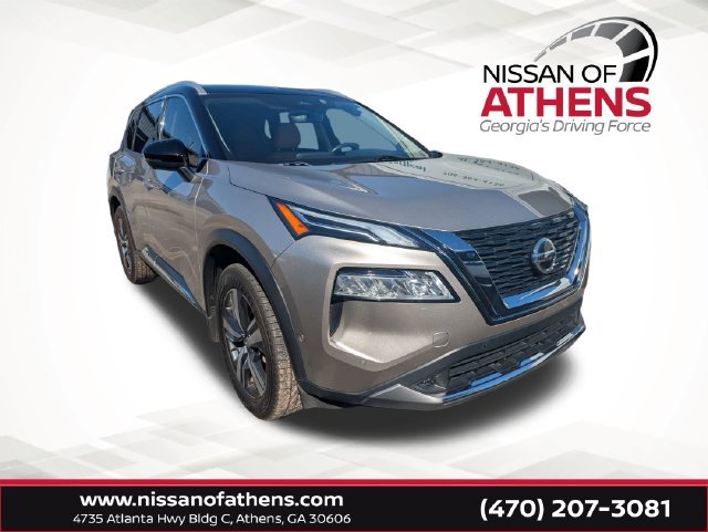 Used 2021 Gold Nissan Platinum image 1