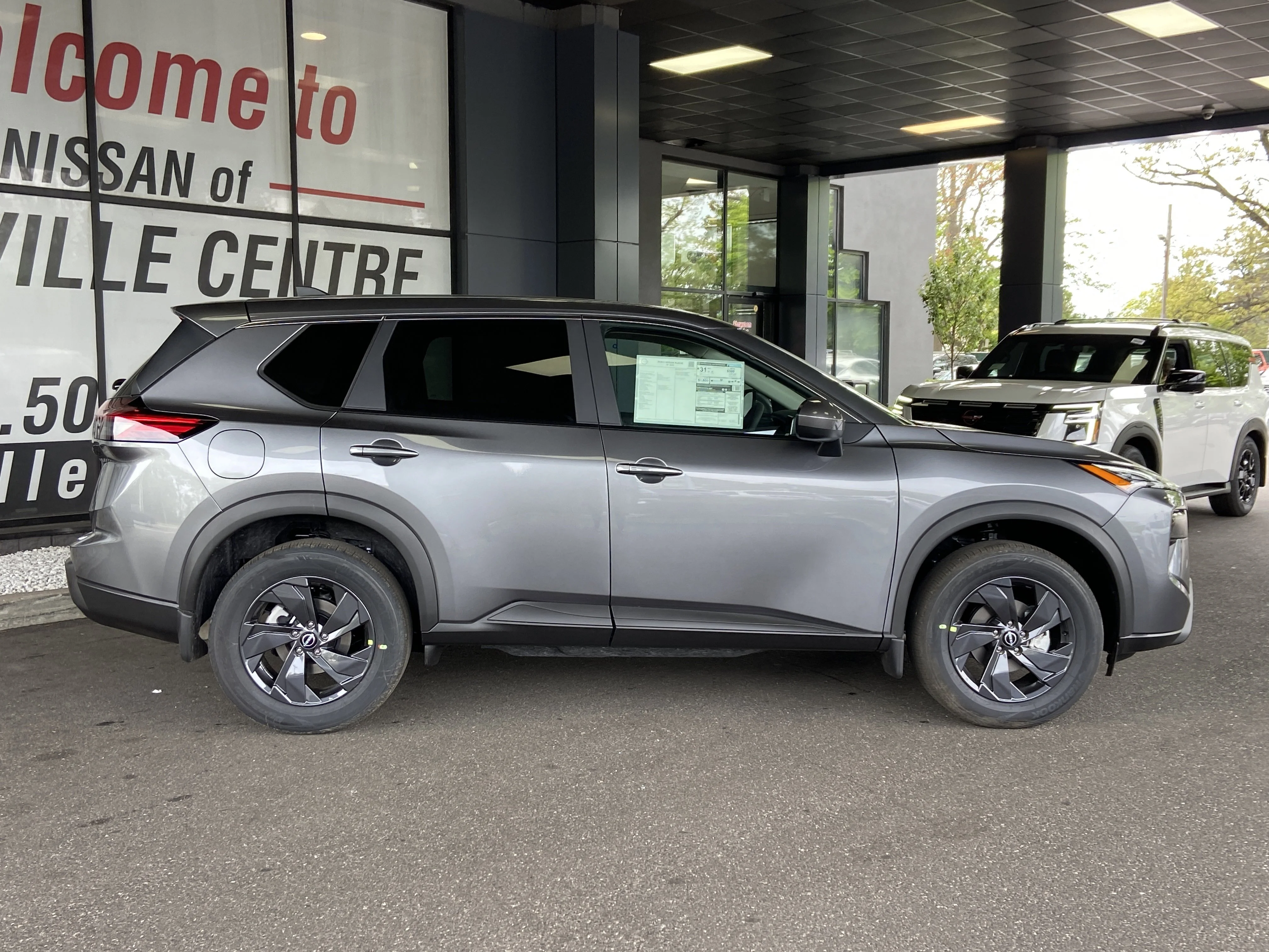 New 2026 Gun Metallic Nissan SV image 3