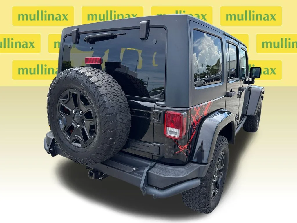 Used 2016 Black Jeep Unlimited Sahara image 4