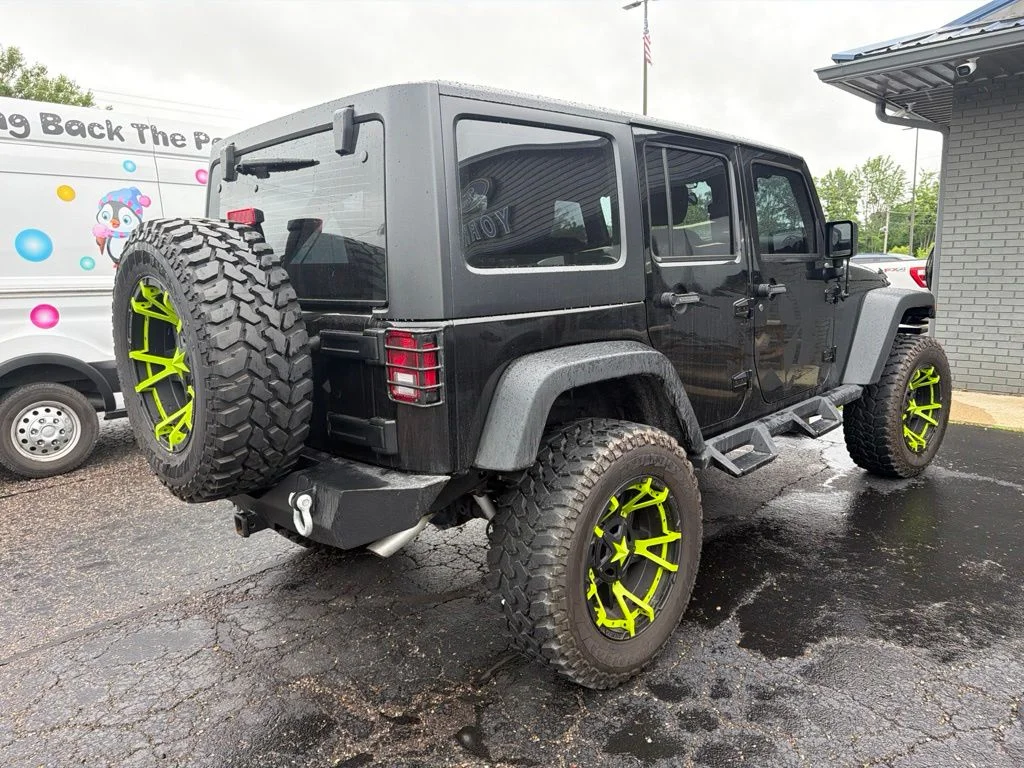 Used 2017 Black Jeep Unlimited Sport image 5