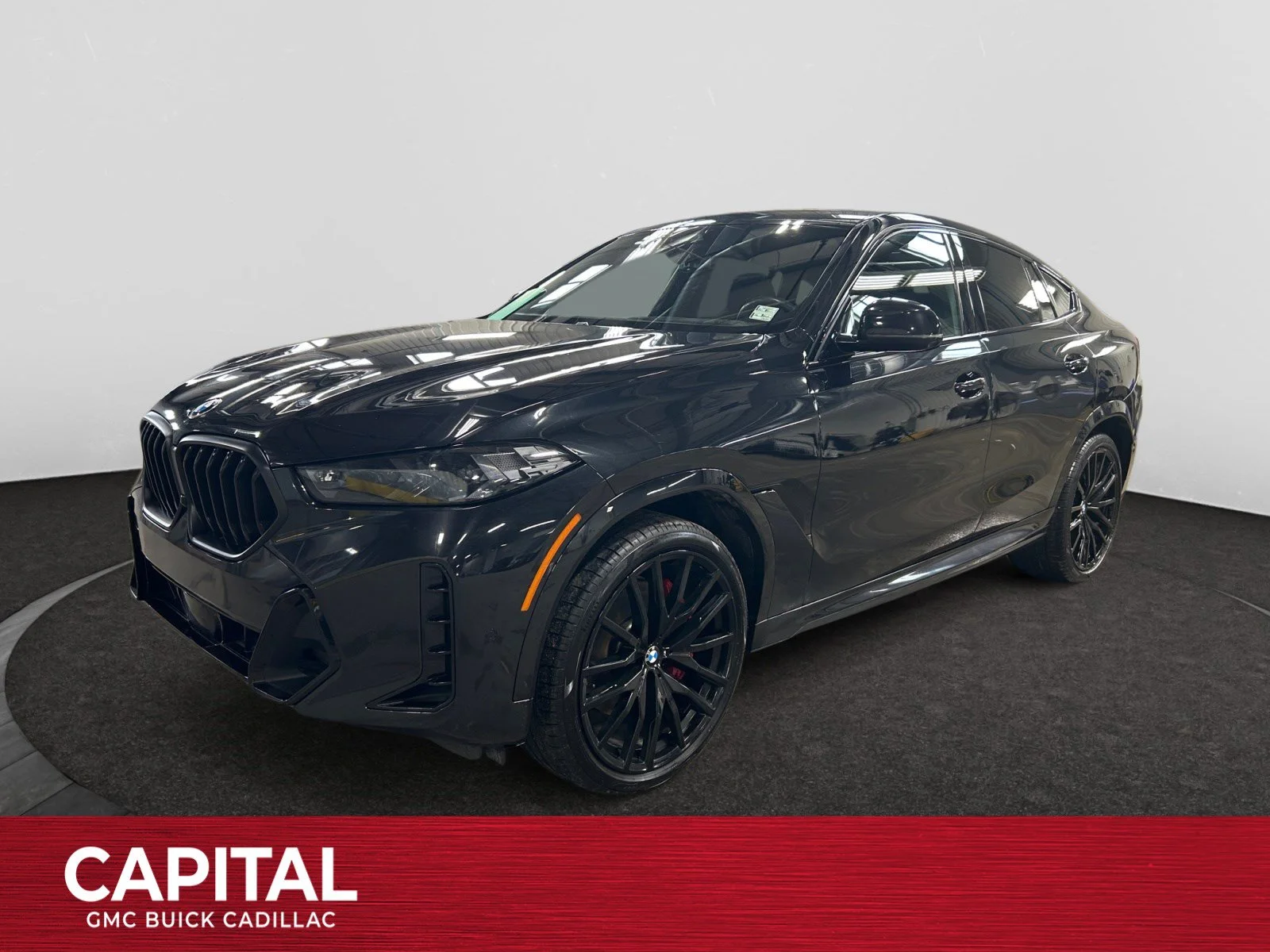 Used 2024 Black BMW xDrive40i image 1