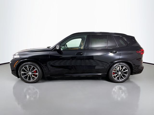 New 2026 Black Sapphire Metallic BMW xDrive50e image 4
