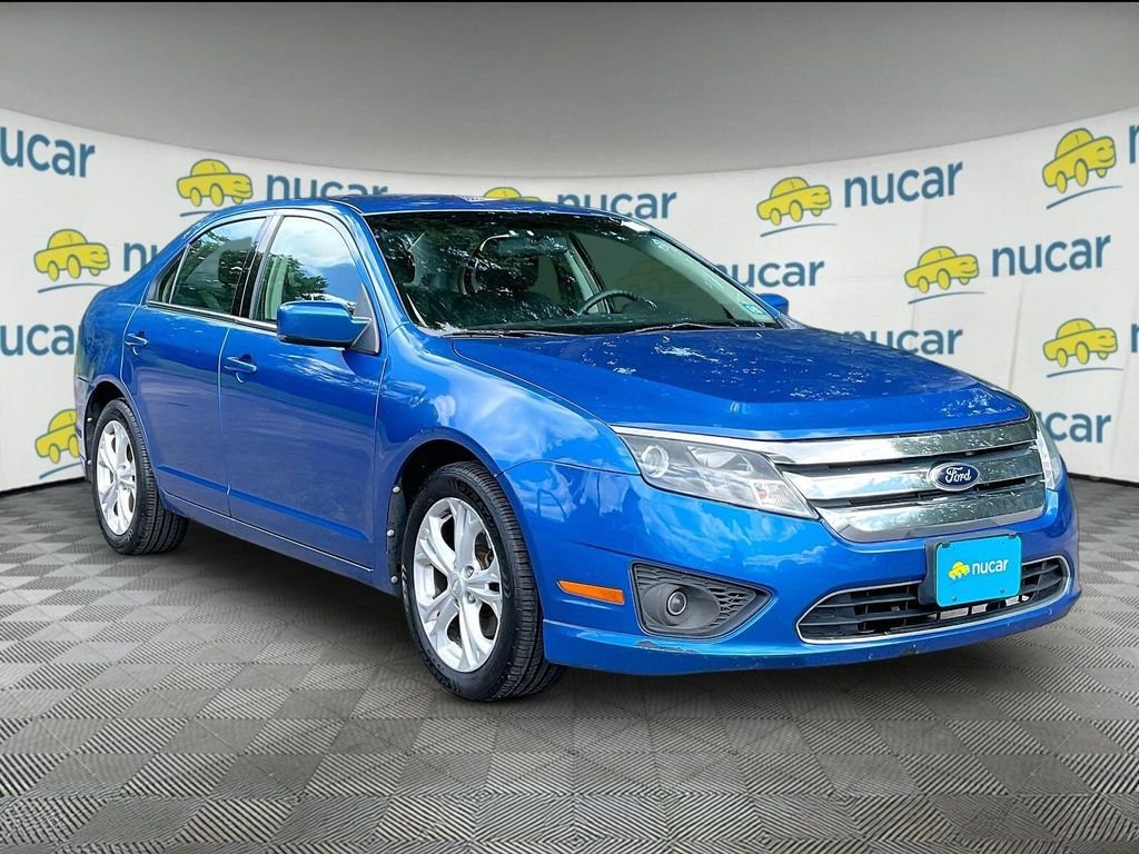 Used 2012 Blue Ford SE image 1