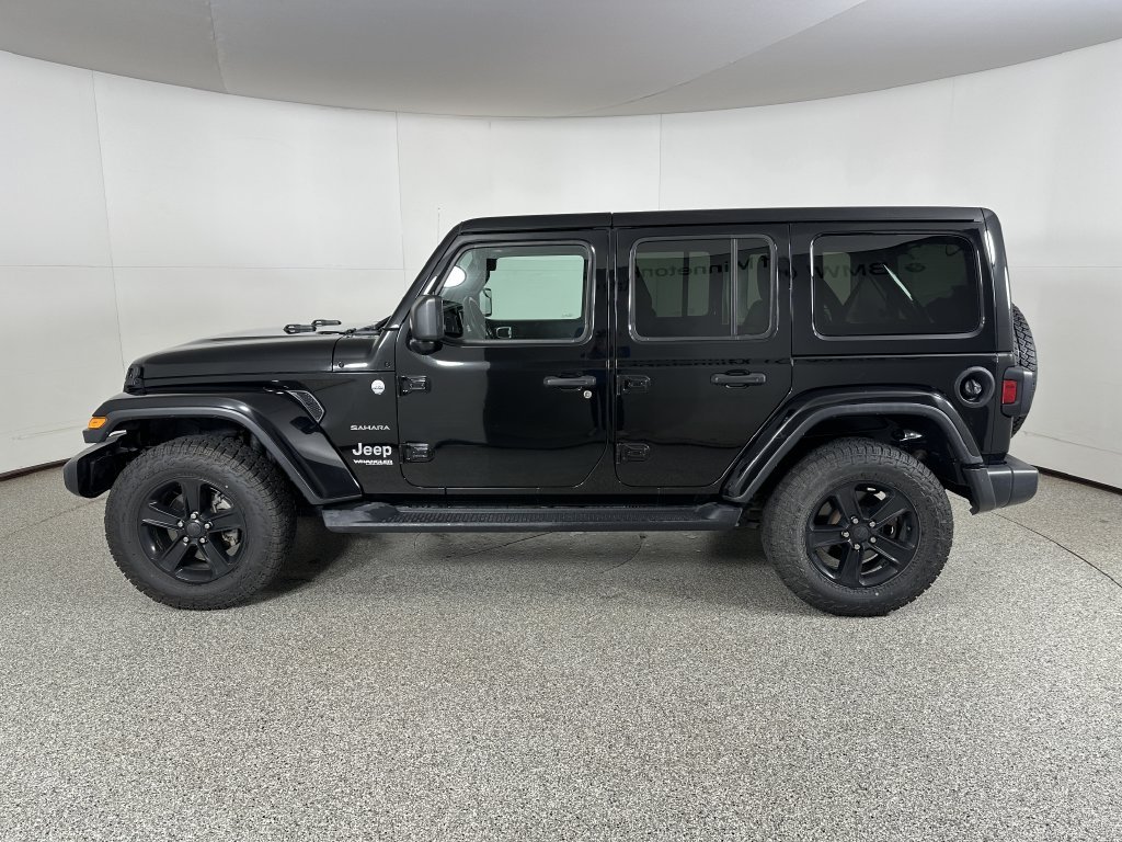 Used 2018 Black Jeep Unlimited Sahara image 6