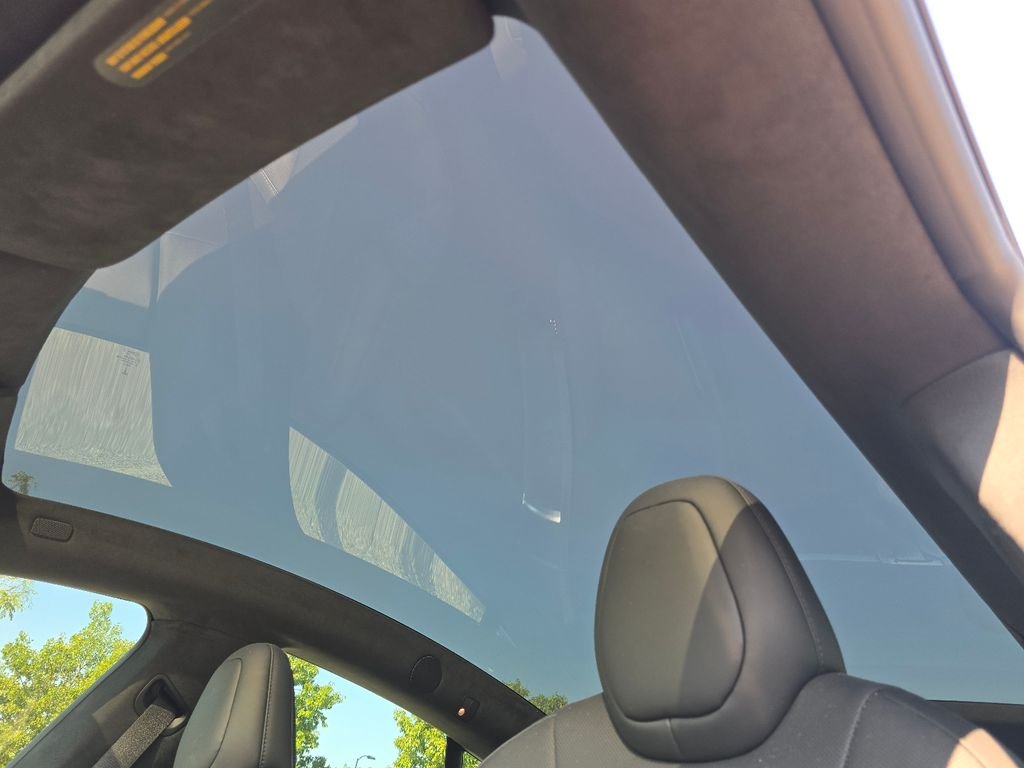 Used 2024 Solid Black Tesla Plaid image 3