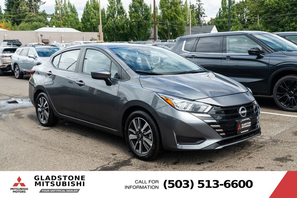 Used 2024 Gun Metallic Nissan 1.6 SV image 1