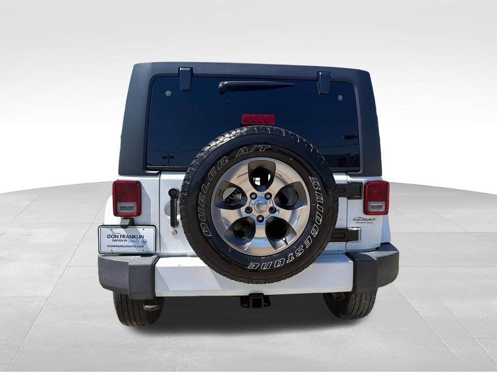Used 2016 White Jeep Unlimited Sahara image 4