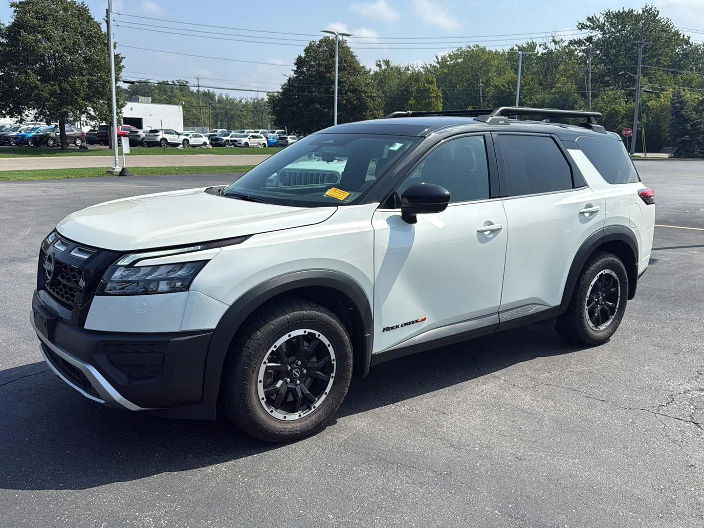 Used 2024 Pearl White Tricoat/Super Black Nissan Rock Creek image 2