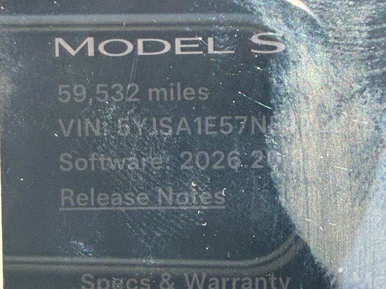 Used 2022 Solid Black Tesla Base image 8