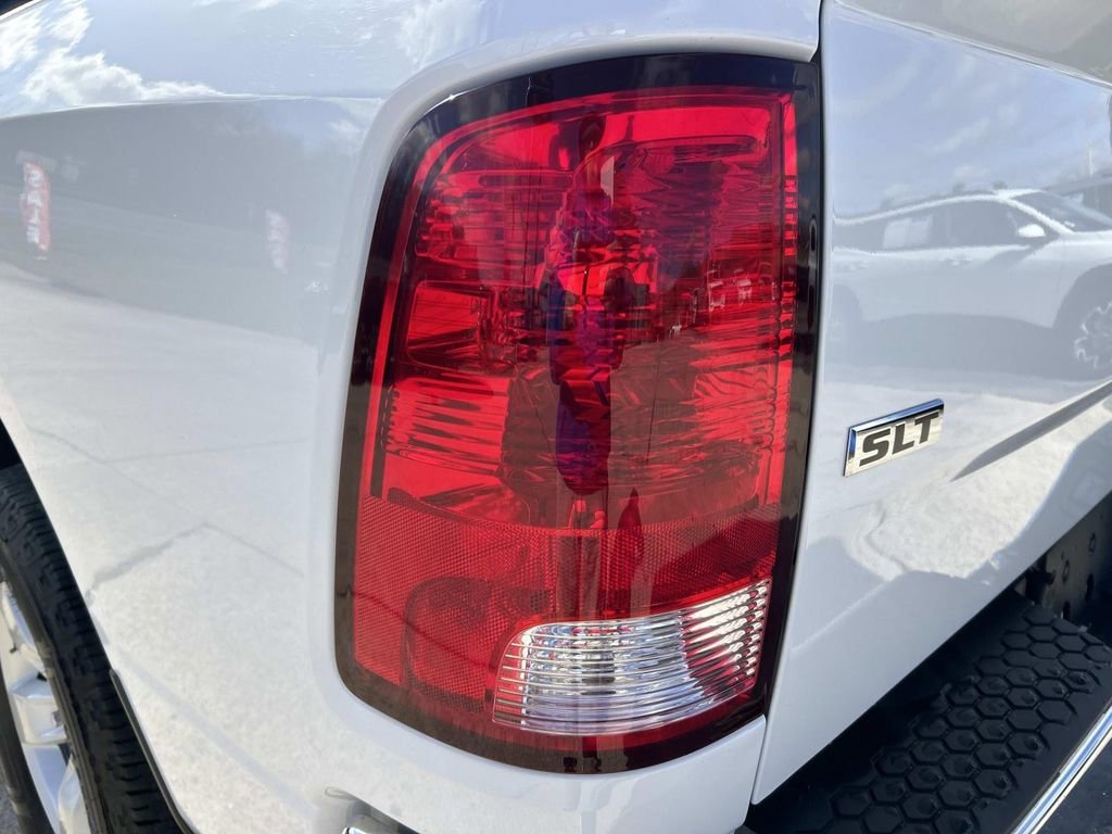 Used 2024 Bright White Cl Ram SLT image 11