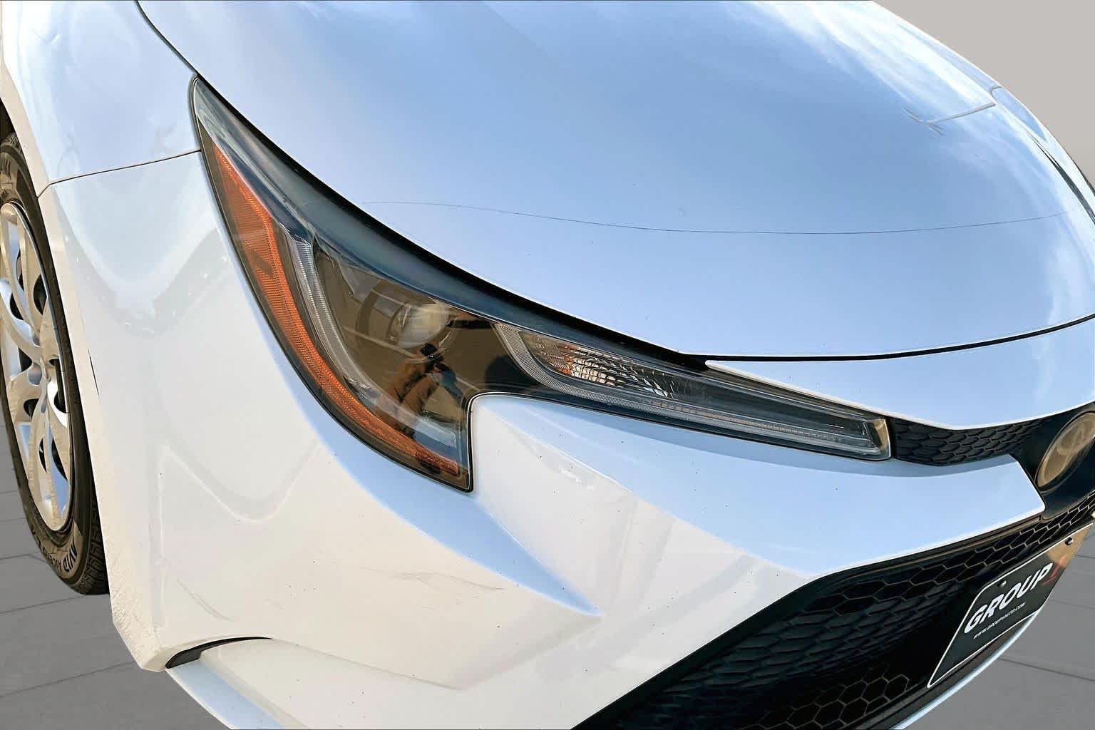 Used 2021 Super White Toyota LE image 28