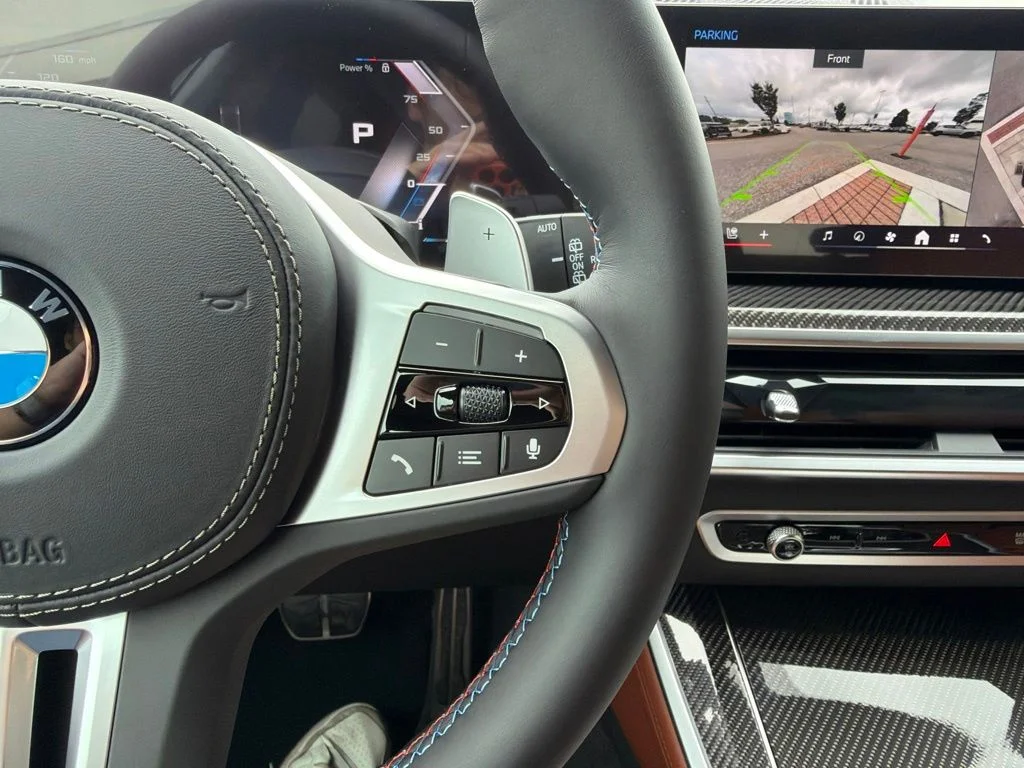 New 2026 Black Sapphire Metallic BMW M60i image 19