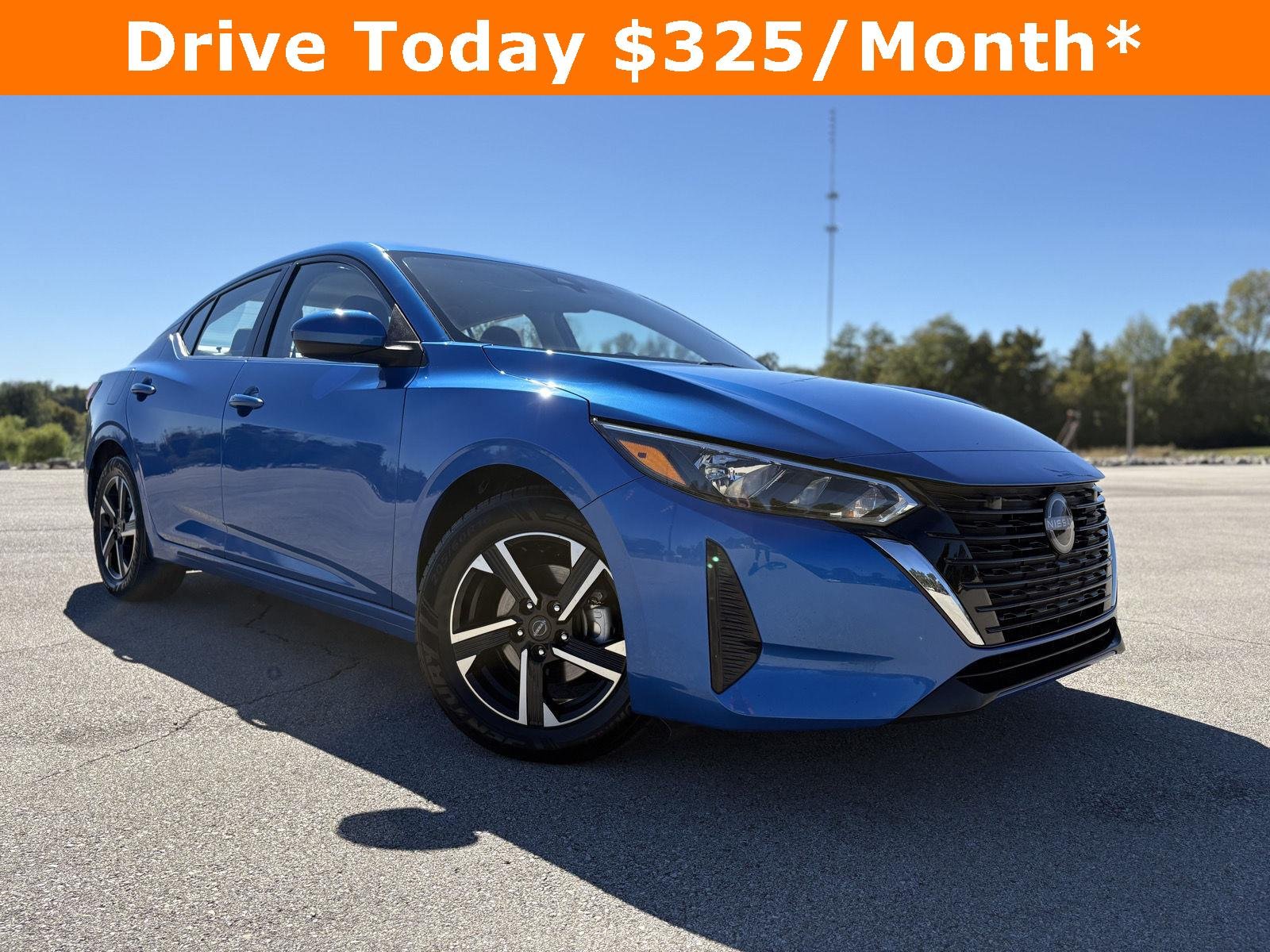 Used 2025 Electric Blue Metallic Nissan SV image 2