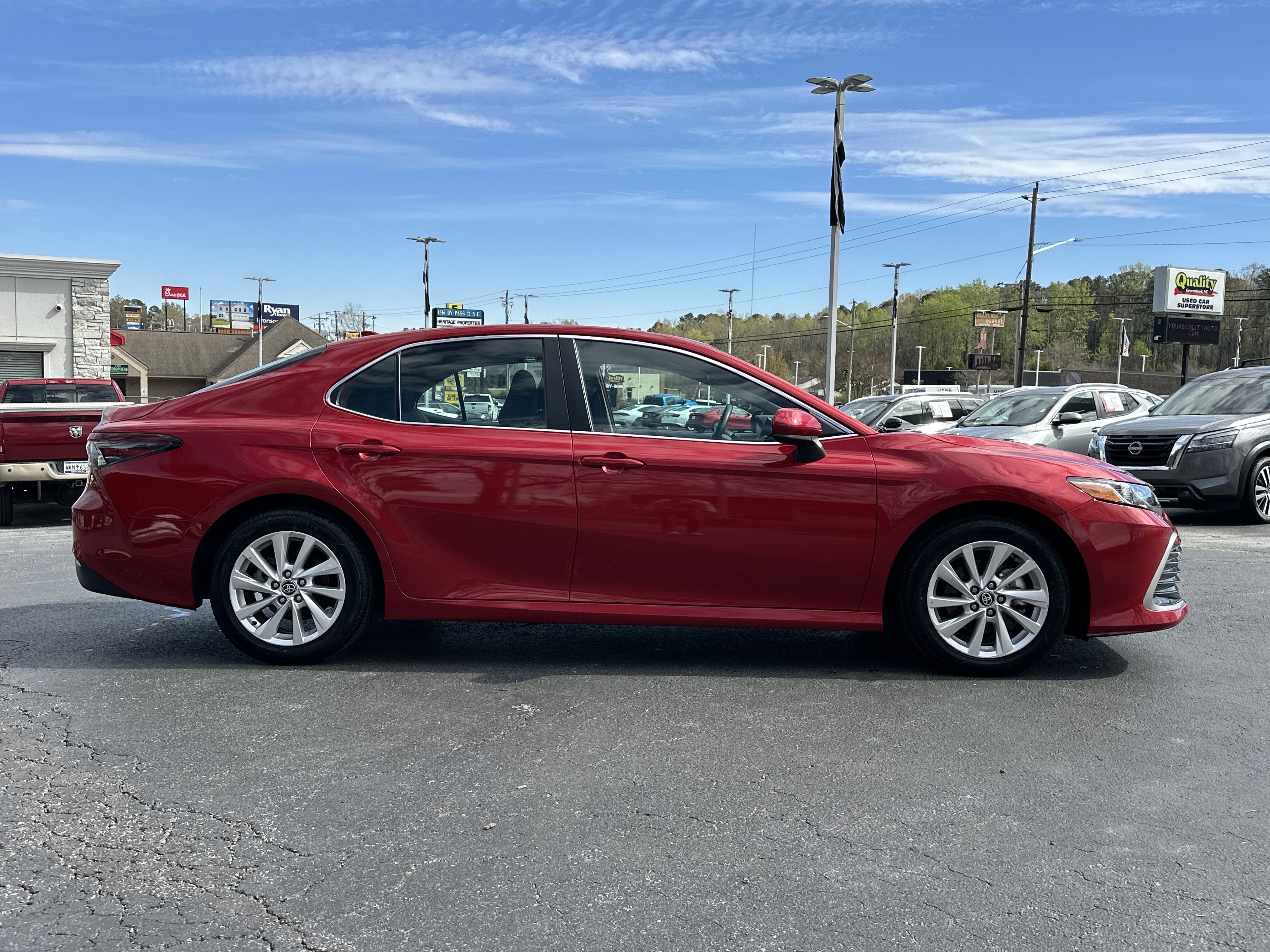 Used 2024 Red Toyota LE image 9