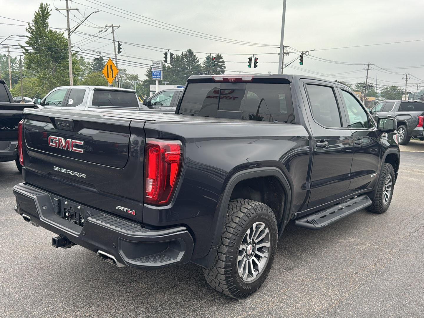 Used 2023 Titanium Rush Metallic GMC AT4 image 6
