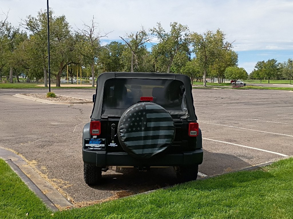 Used 2016 Black Clearcoat Jeep Sport image 4