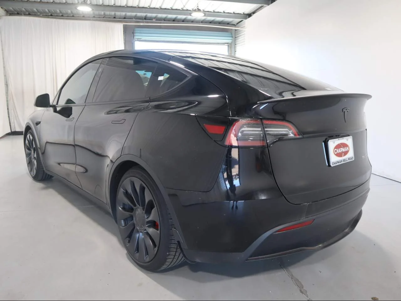 Used 2024 Solid Black Tesla Performance image 7