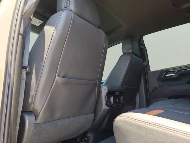 Used 2023 Desert Sand Metallic GMC AT4 image 9
