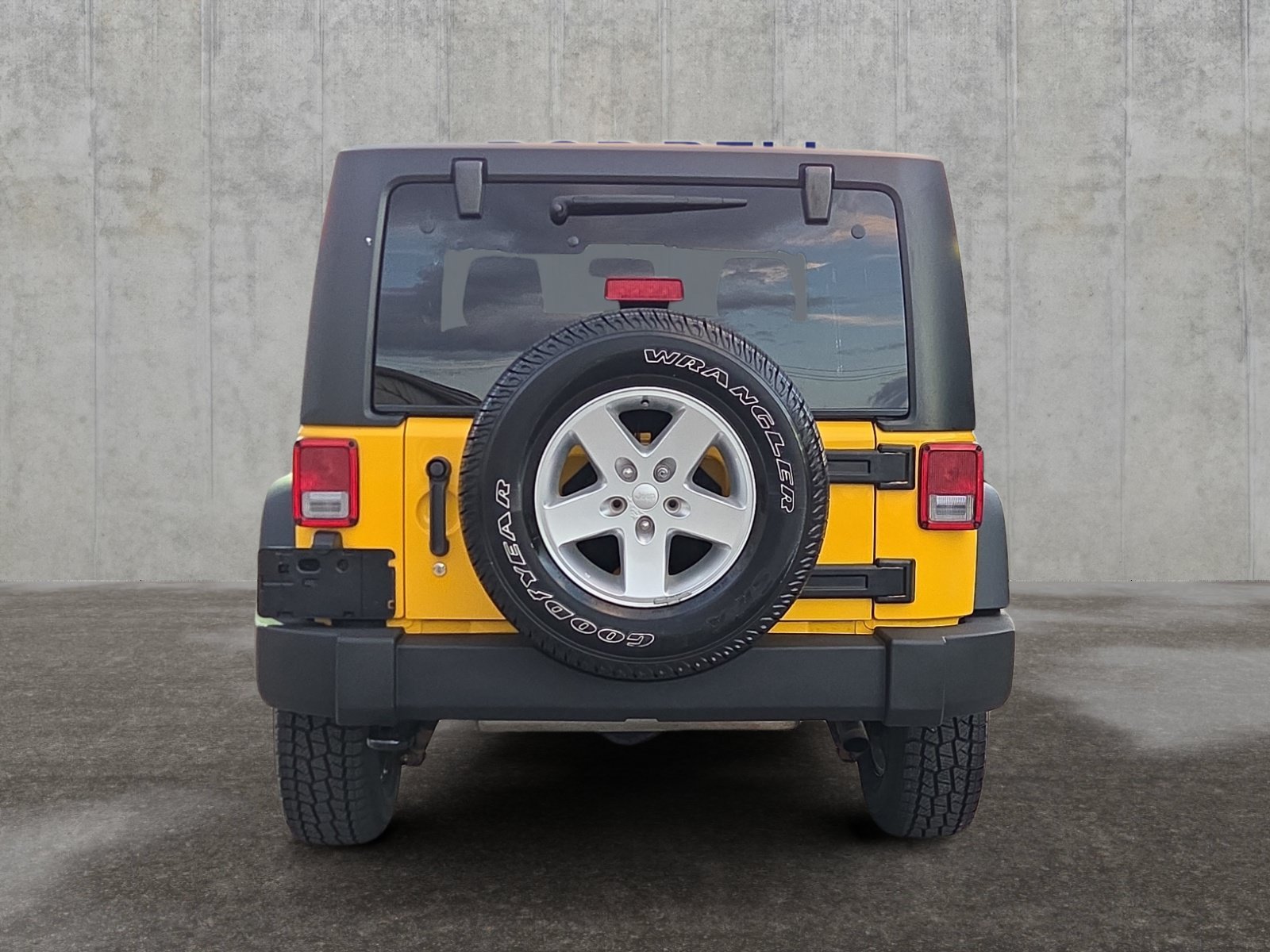 Used 2015 Baja Yellow Clearcoat Jeep Sport image 4