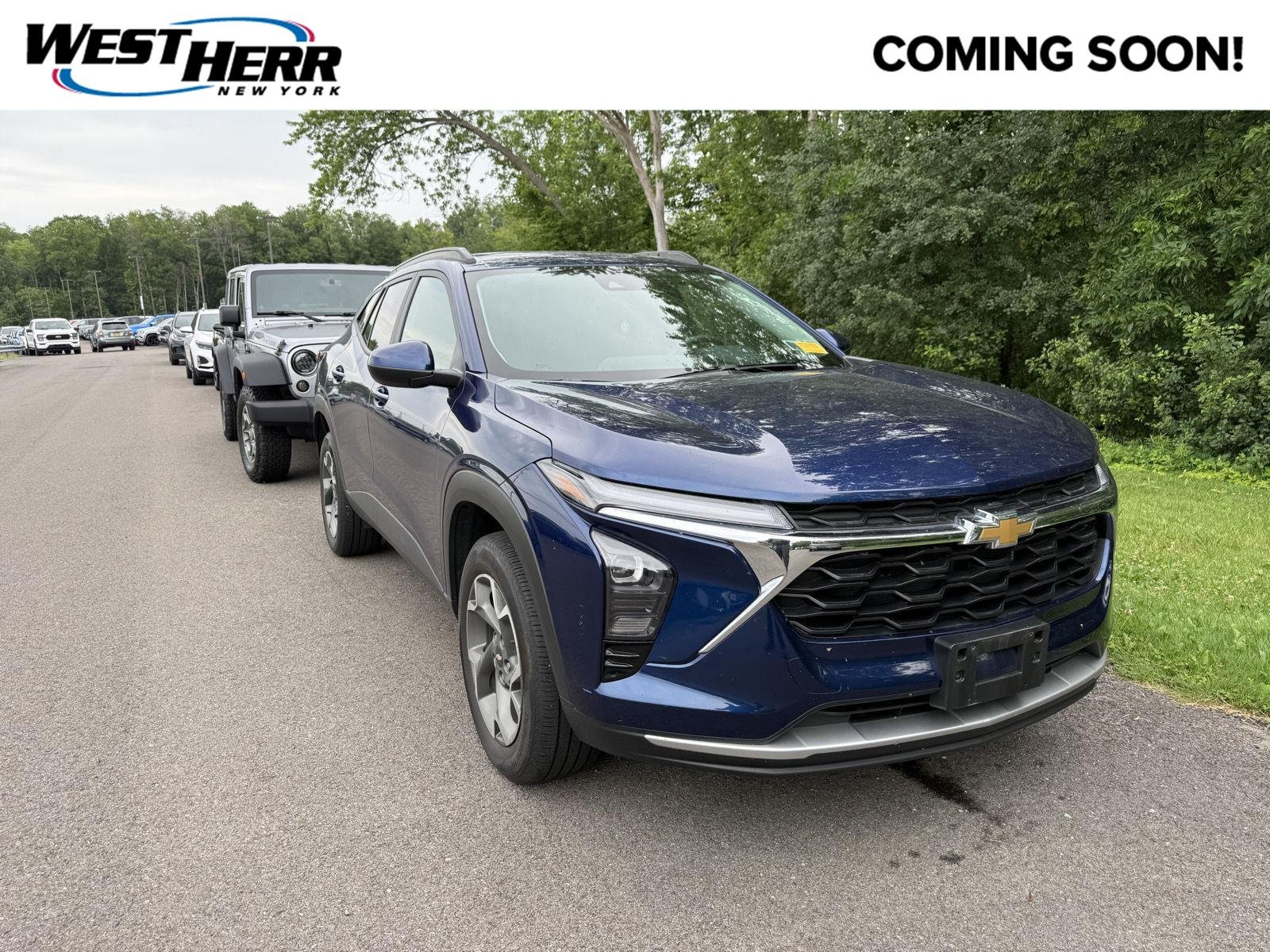 Used 2024 Blue Glow Metallic Chevrolet LT image 1