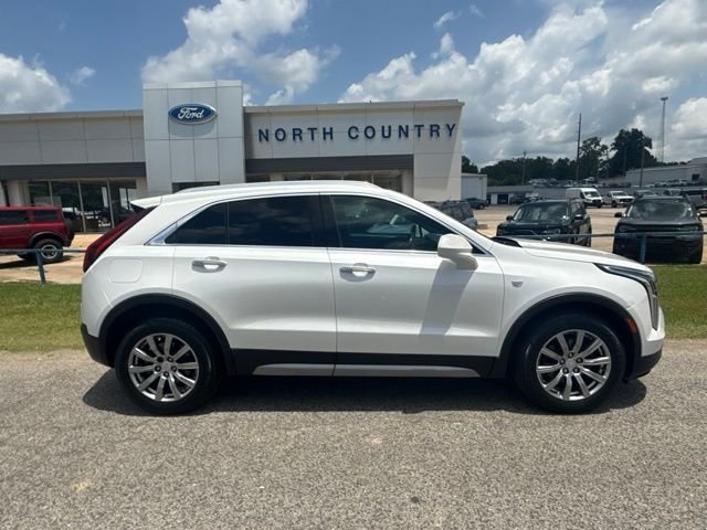 Used 2019 White Cadillac Premium Luxury image 1