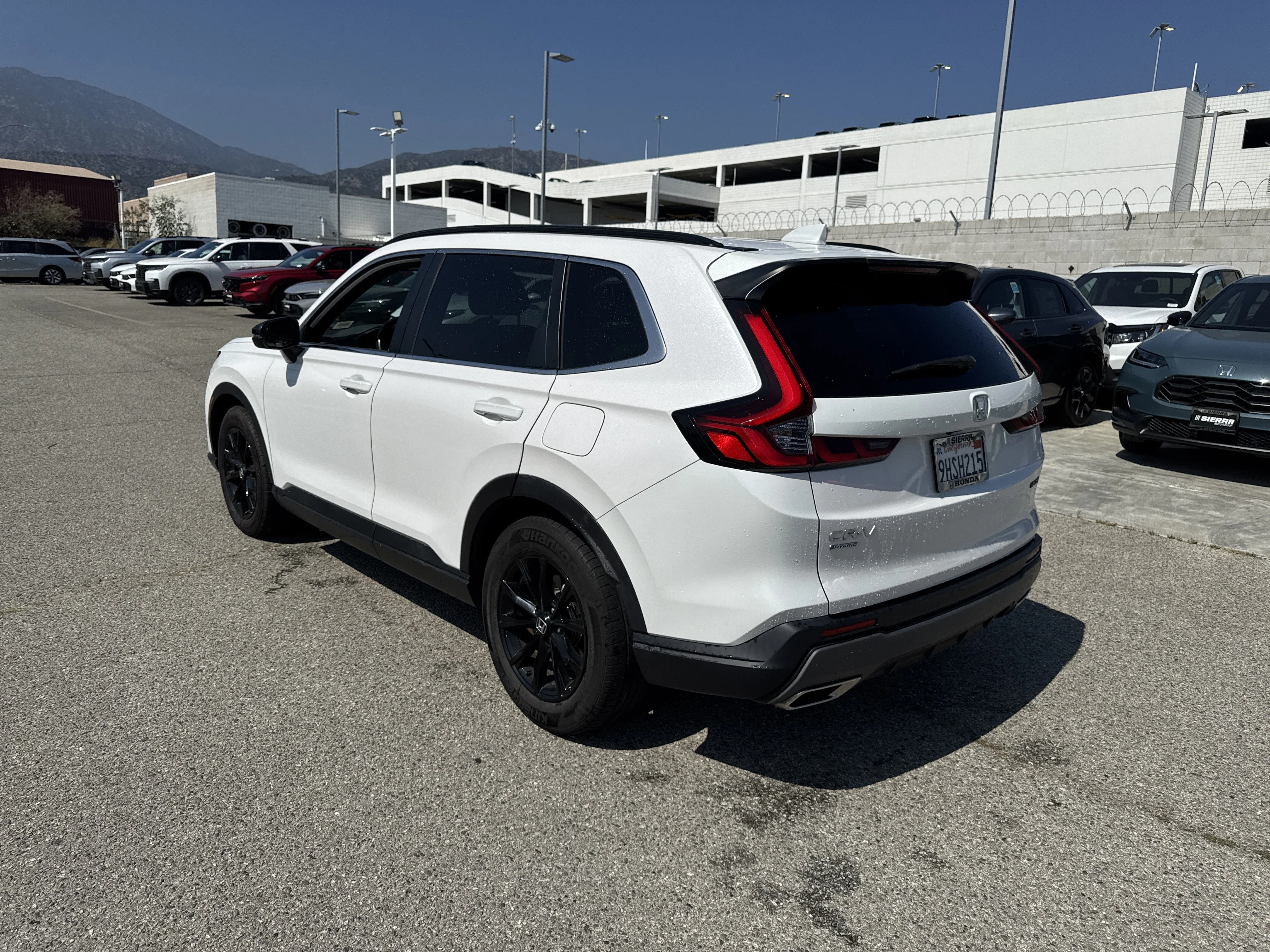Used 2023 Platinum White Pearl Honda Sport image 4