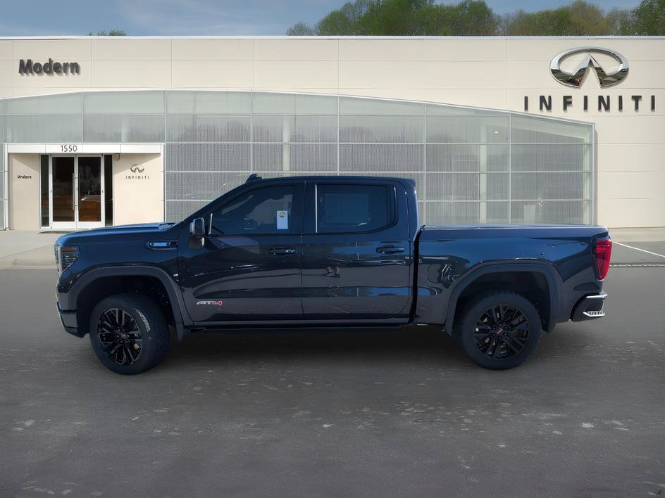 Used 2024 Titanium Rush Metallic GMC AT4 image 6