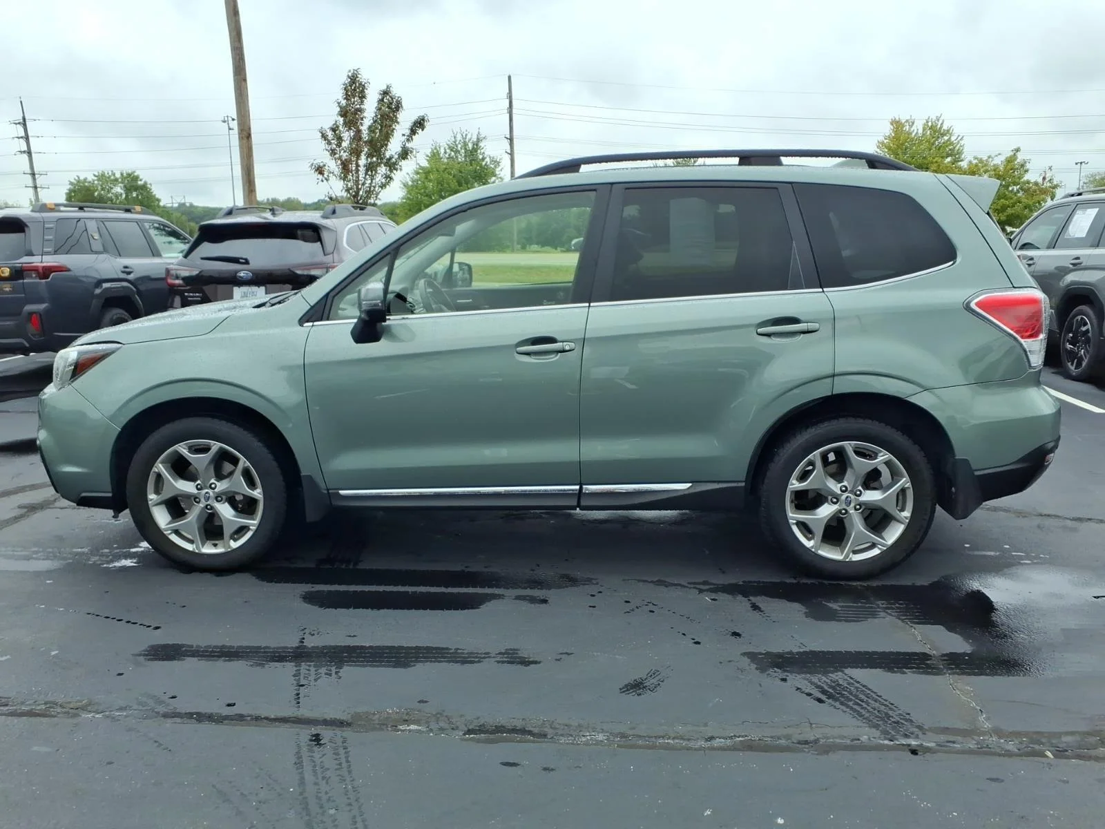 Used 2017 Jasmine Green Metallic Subaru Touring image 4