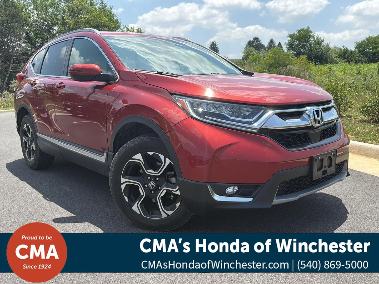 Used 2017 Molten Lava Pearl Honda Touring image 1