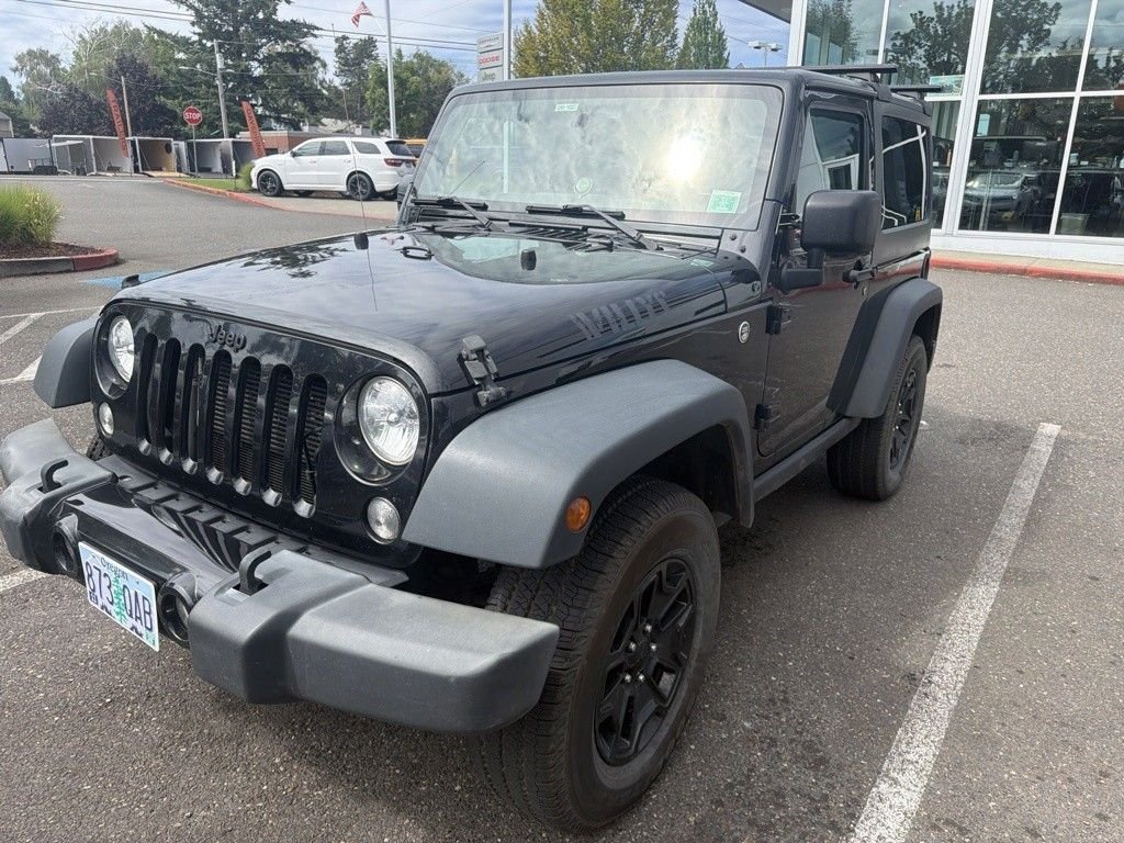 Used 2016 Black Clearcoat Jeep Sport image 2