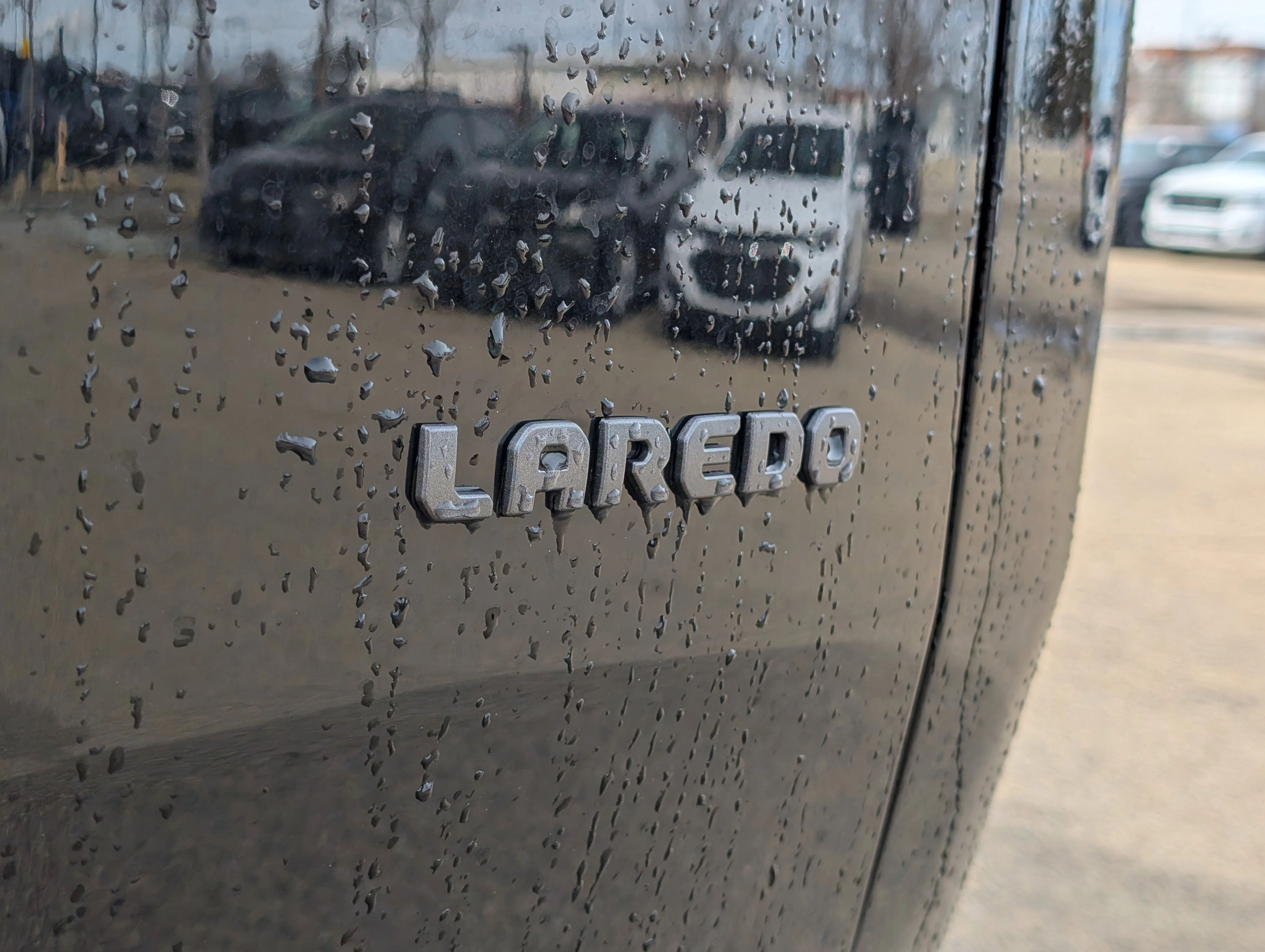 New 2026 Diamond Black Crystal Pearl Jeep Laredo image 14