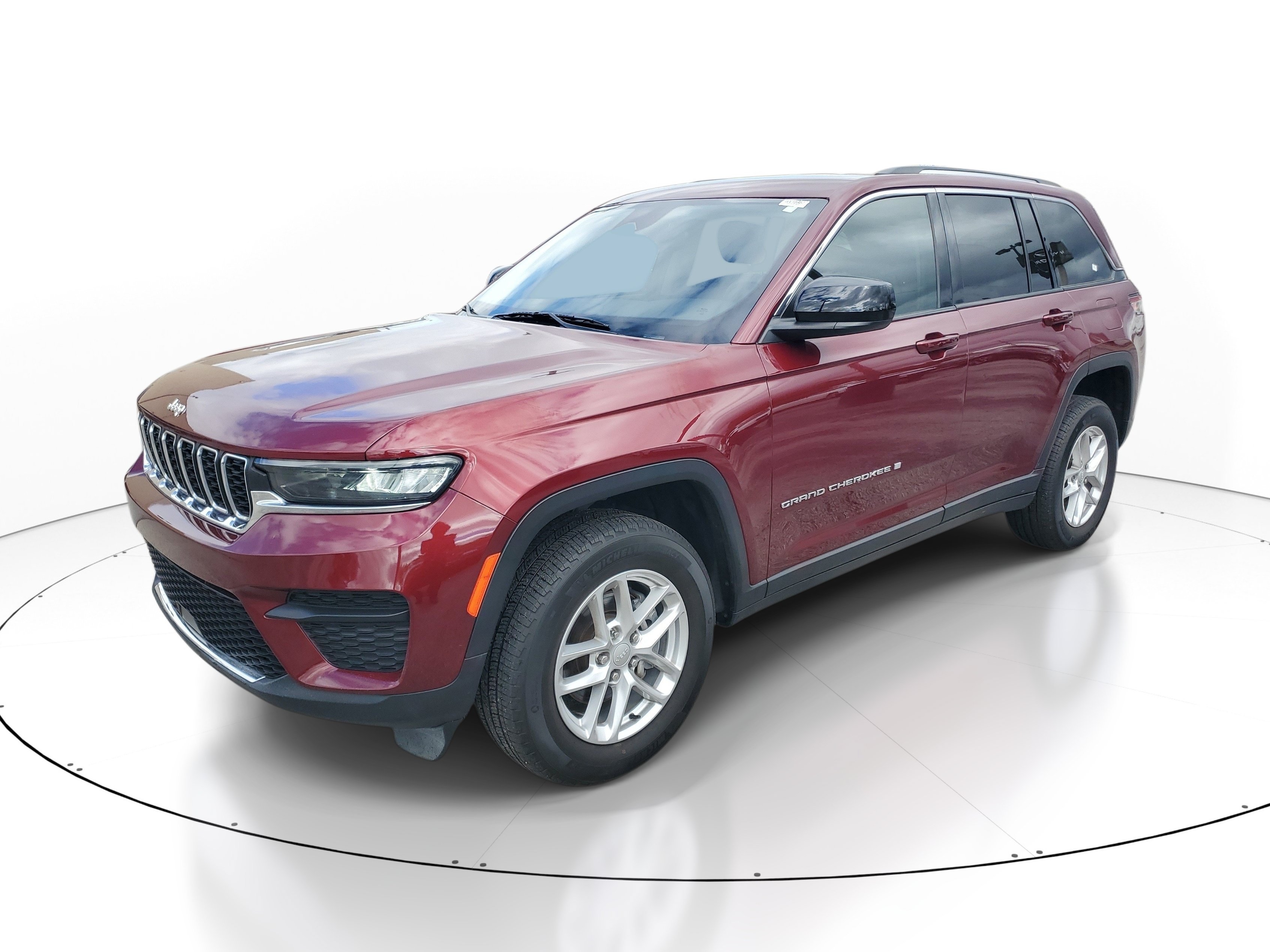 Used 2023 Velvet Red Pearlcoat Jeep Laredo image 2
