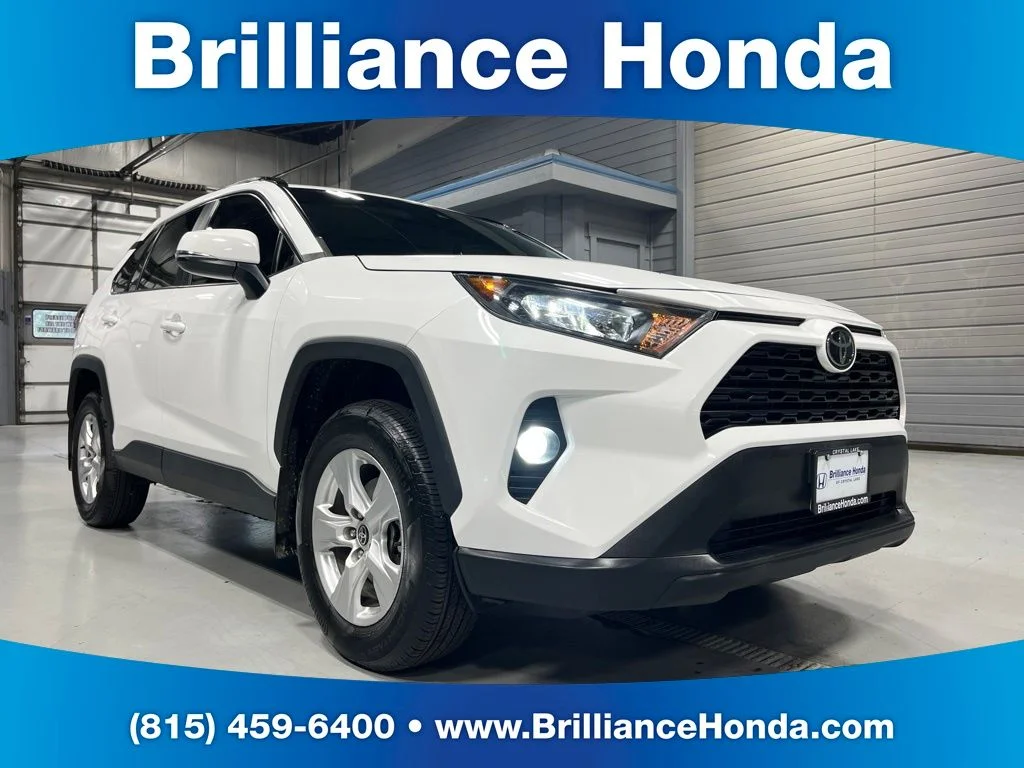 Used 2021 Super White Toyota XLE image 1