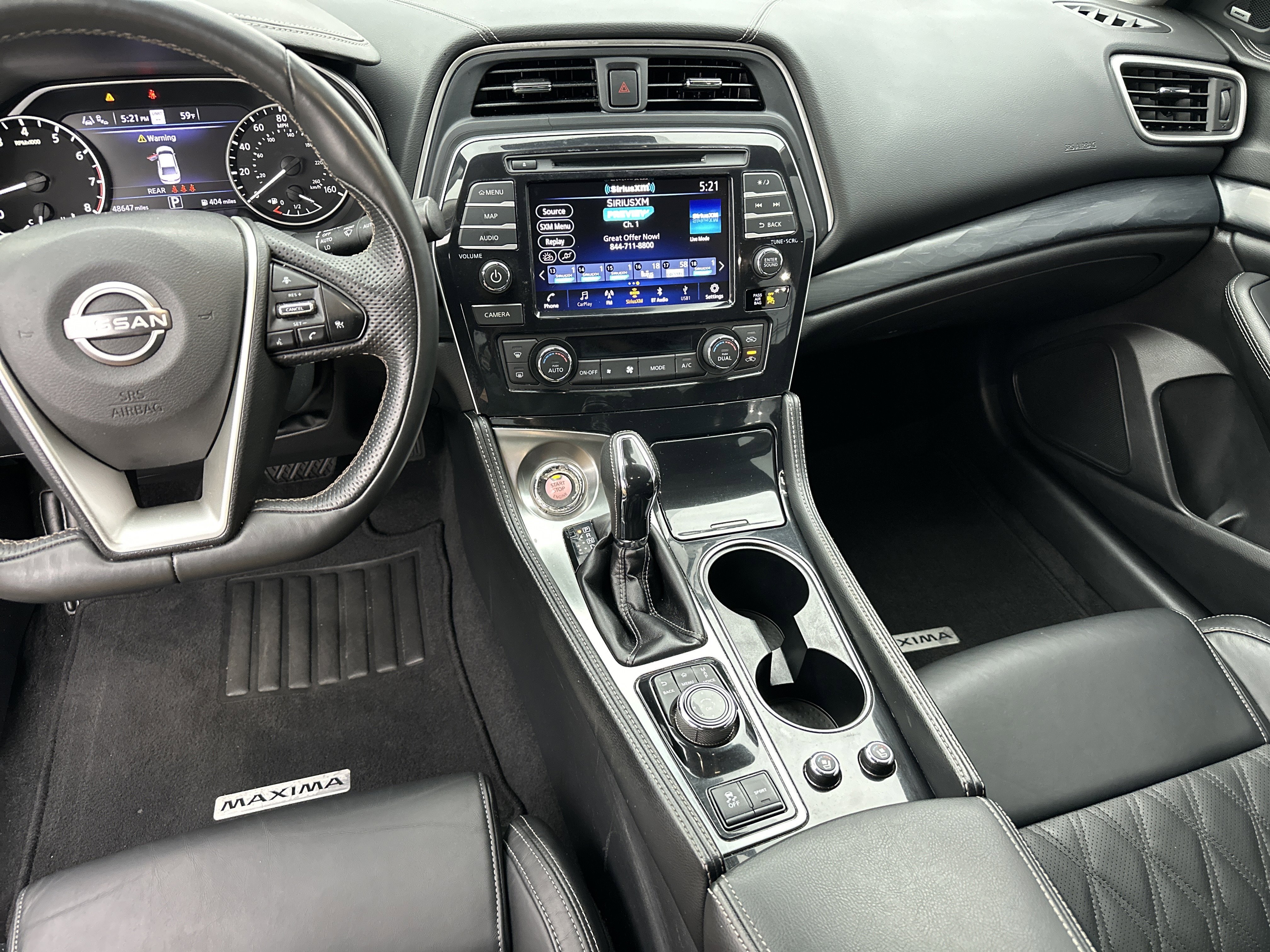 Used 2023 Super Black Nissan Platinum image 24