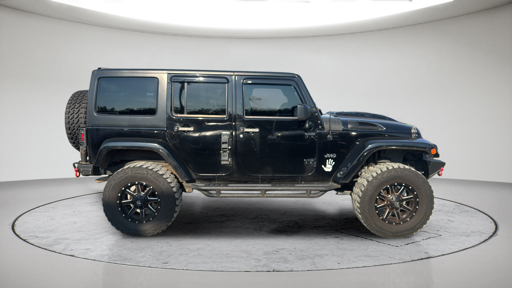 Used 2015 Black Jeep Unlimited Sahara image 4