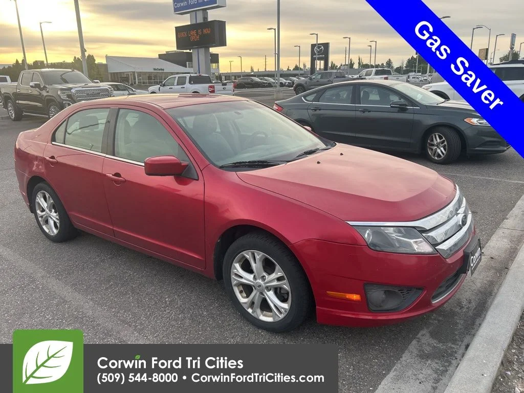 Used 2012 Red Candy Metallic Tinted Clearcoat Ford SE image 1