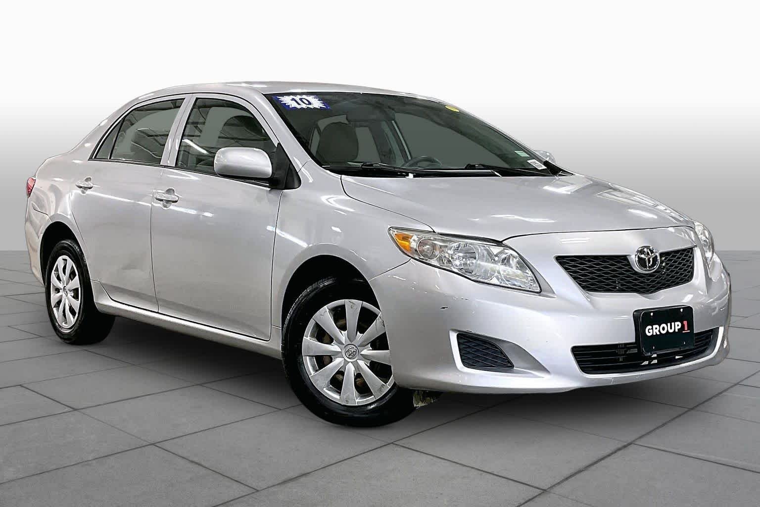 Used 2010 Classic Silver Metallic Toyota LE image 2