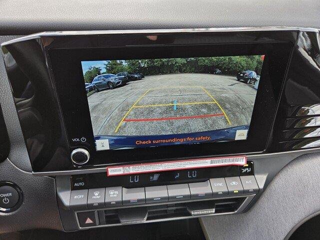 Used 2026 Reservoir Blue Toyota LE image 16