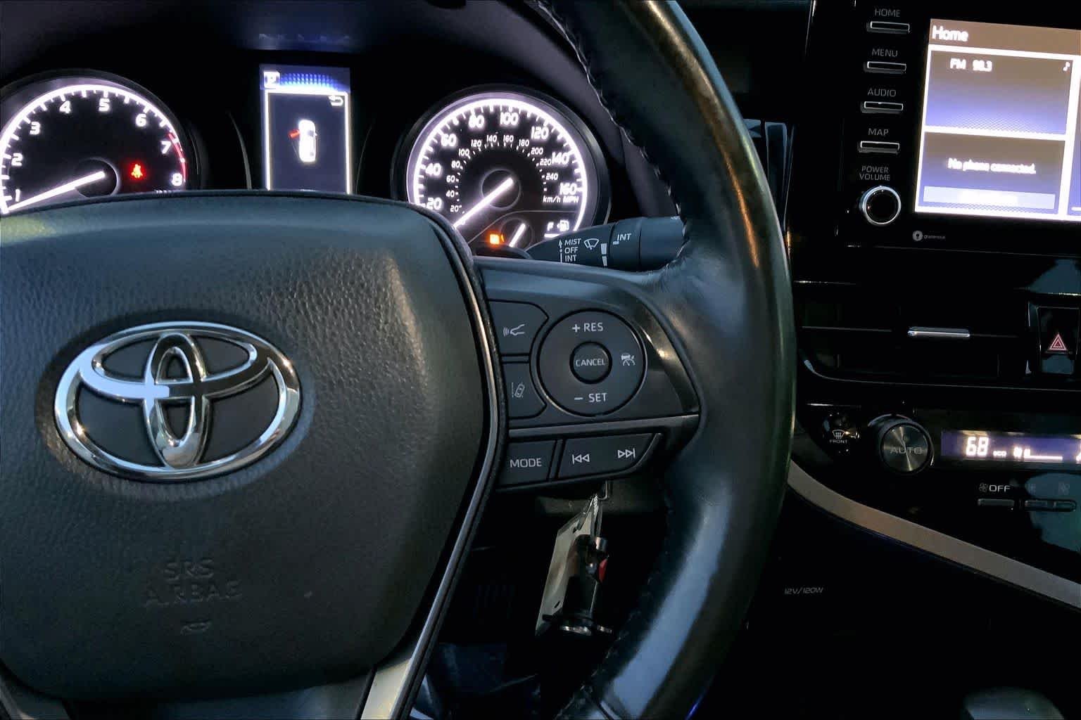 Used 2024 Cavalry Blue Toyota SE image 24