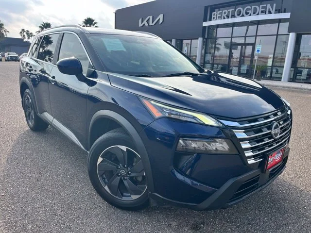Used 2024 Blue Nissan SV image 1